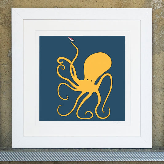 Giclee original artwork print in a white mounted frame. A gold coloured octopus is on a dark blue navy background. In one of its tentacles it is holding up a pink winged seagull looking down. 