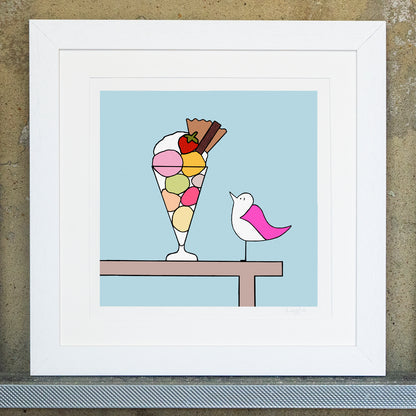 Giclee original artwork print in a white mounted frame. Square framed print of a pink winged seagull looking at an icream sundae with strawberry, flake, wafer and cream in a tall glass. The background is blue with a table outline holding the bird and desert.