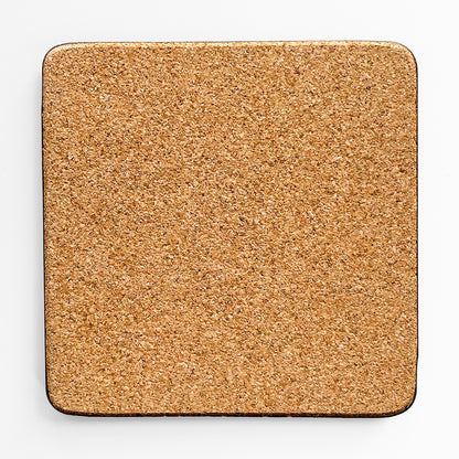 Back of the coaster made of eucaplyptus board with cork, the back is textured and a beige brown colour.