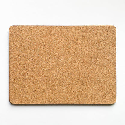 Back of the placemat made of eucaplyptus board with cork, the back is textured and a beige brown colour.