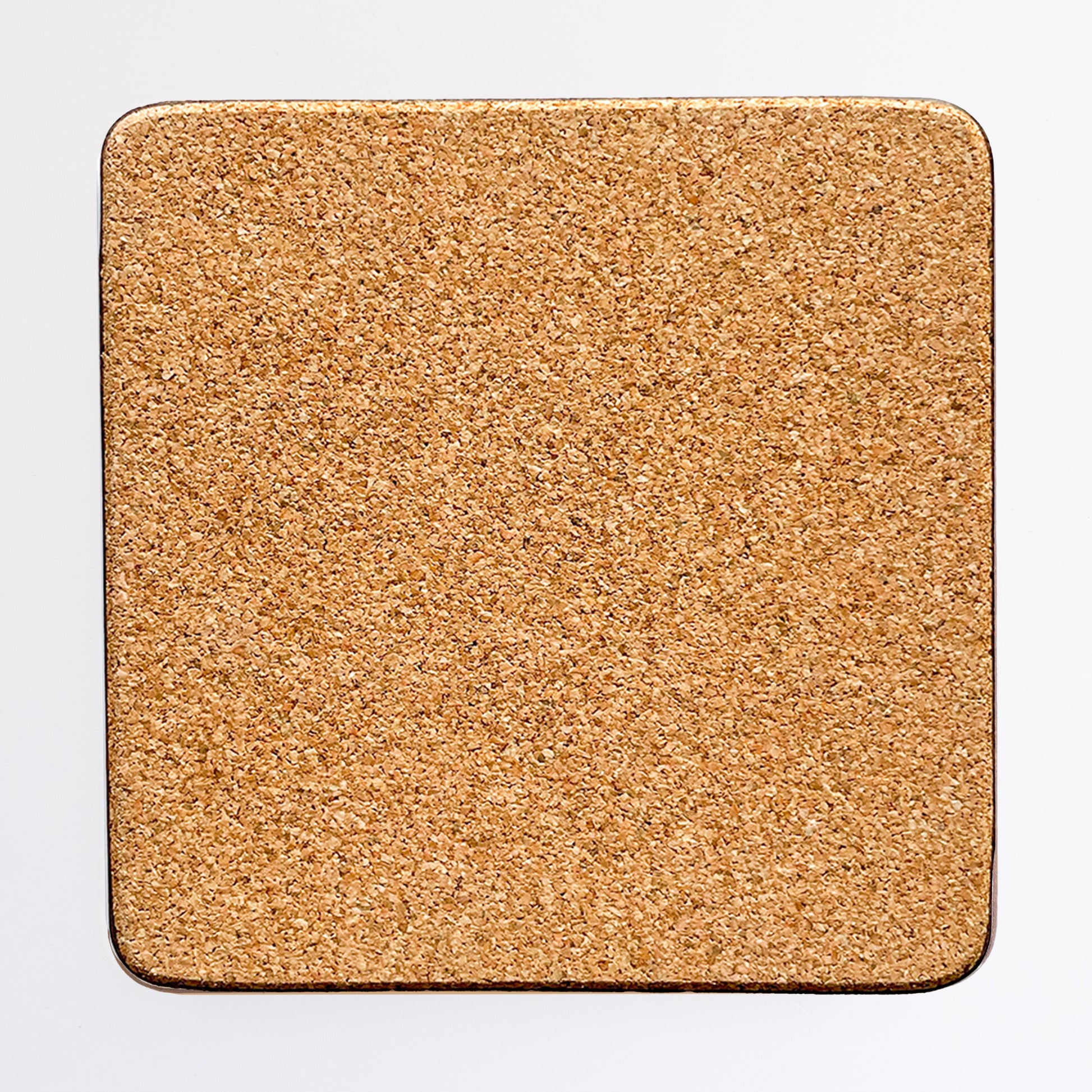 Back of the coaster made of eucaplyptus board with cork, the back is textured and a beige brown colour.