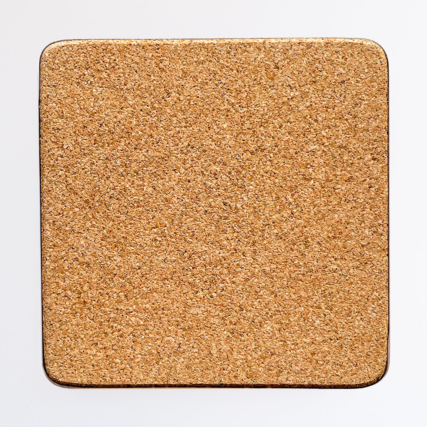 Back of the coaster made of eucaplyptus board with cork, the back is textured and a beige brown colour.