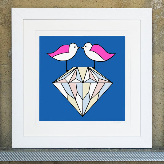 Giclee original artwork print in a white mounted frame. Two pink winged seagulls are facing each other perched on top of a big diamond. The diamond is covered in pale blue, pink, white and yellow triangular shapes. The background is a bright blue, all details and shapes are outlined in black.