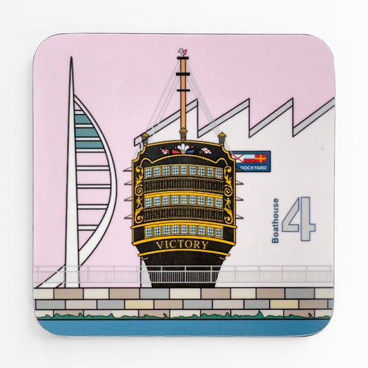 A pink coaster with the back of the victory and portsmouth dockyard. Boathouse is in the distance with the spinnaker tower. A pink winged seagull is perched on top of the victory mast, at the bottom of the ship is a brick wall and rail and infront is the sea.