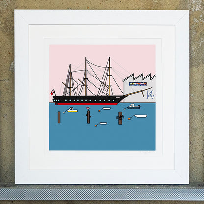 Giclee original artwork print in a white mounted frame. The HMS Warrior is in the sea surrounded by small boats and three groynes. In the background is boathouse 4, the sky is a pale pink with a teal coloured sea. One small pink winged seagull is perched on top a groyne looking out.