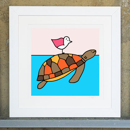 Giclee original artwork print in a white mounted frame. A turtle with orange, ochres and browns on it's shell. The turtle is swimming in bright blue aqua water with a pink winged seagull perched on its back. The sky is a pale pink and all the details and shapes are outlined in thick black. The print is called ride on time.